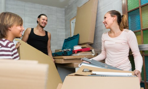 Man and van loading furniture in a residential Eelpieisland setting