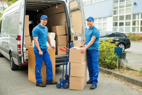 Worker using PPE during a van loading operation