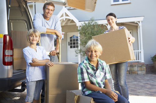 Packed boxes and furniture prepared for van loading